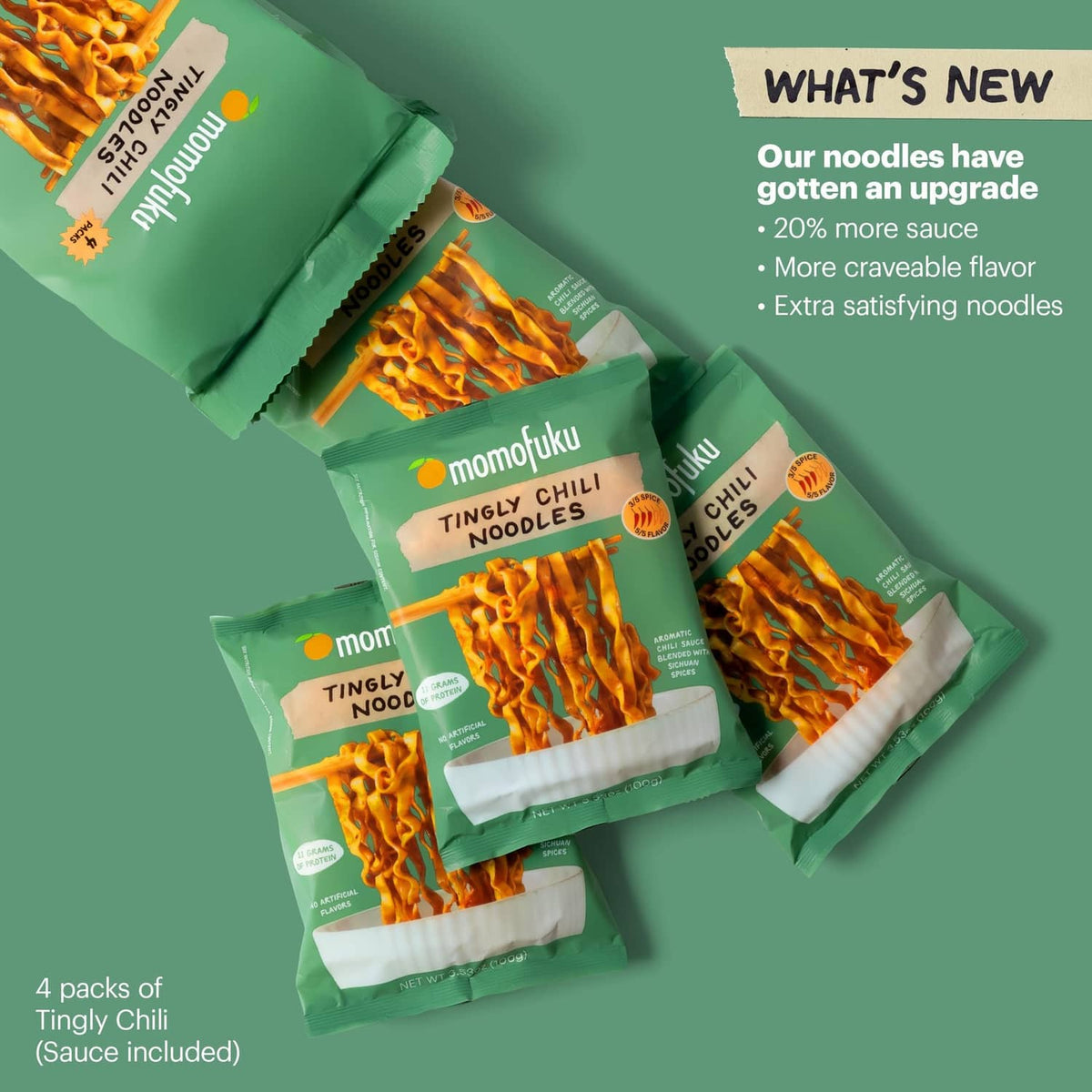 Four tingly chili ramen noodle pouches and sauce sachets arranged for display