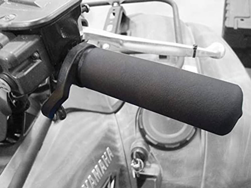Black rubber hand throttle grip mounted on handlebar near controls