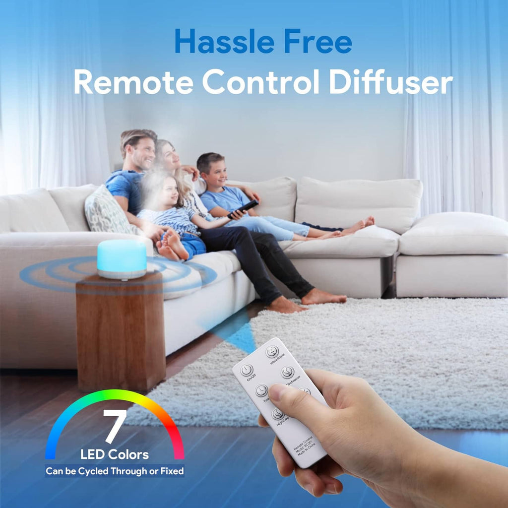 White essential oil diffuser with remote control for power and mist settings