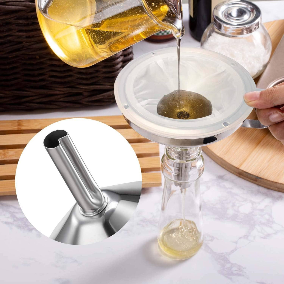 Stainless steel funnel pouring liquid into jar with included sealing screen