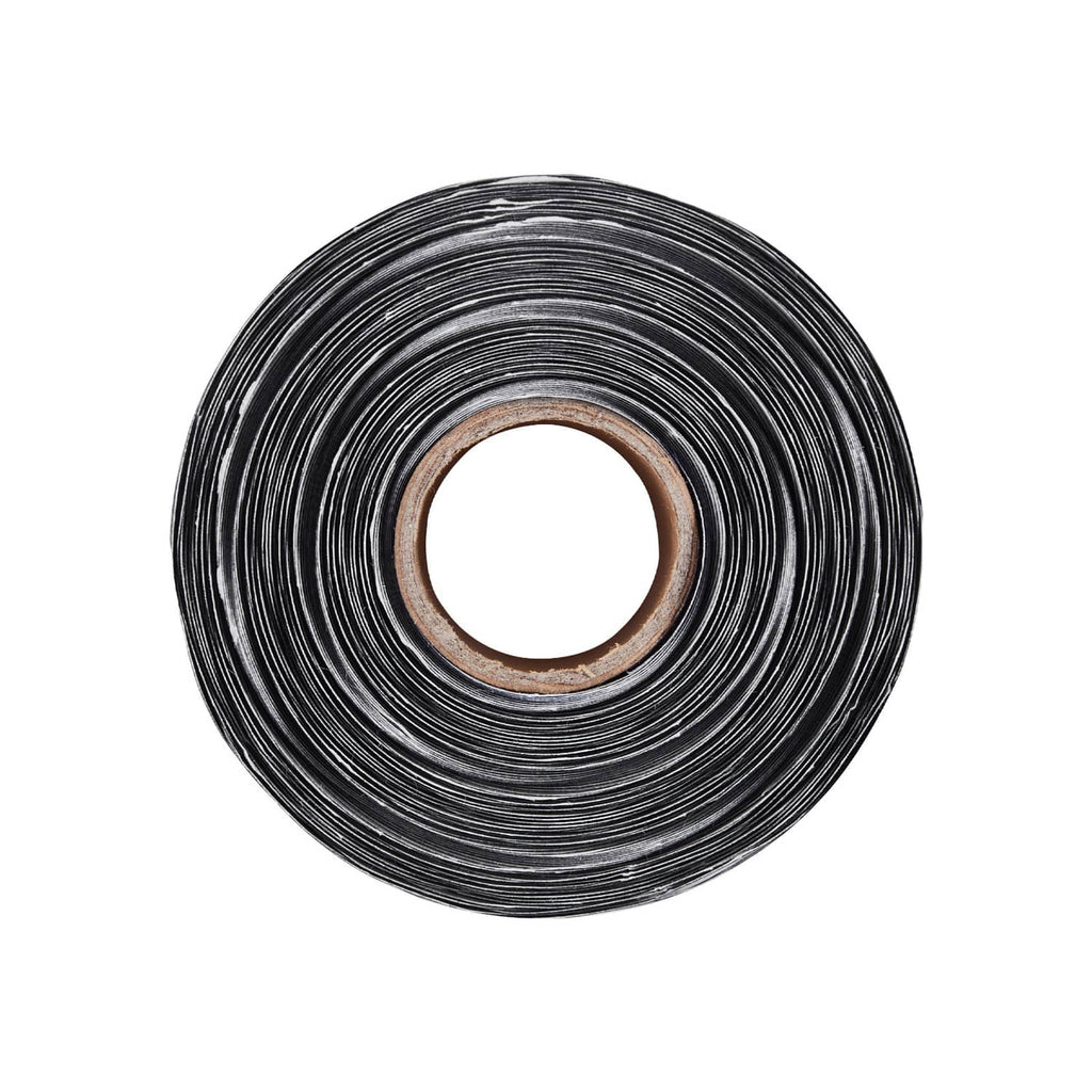 Rolled coil of black scalloped border trim with white wire-like lines around the center