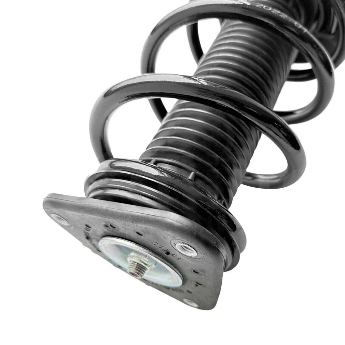 Coiled shock strut spring with mounting plate and rubber seal