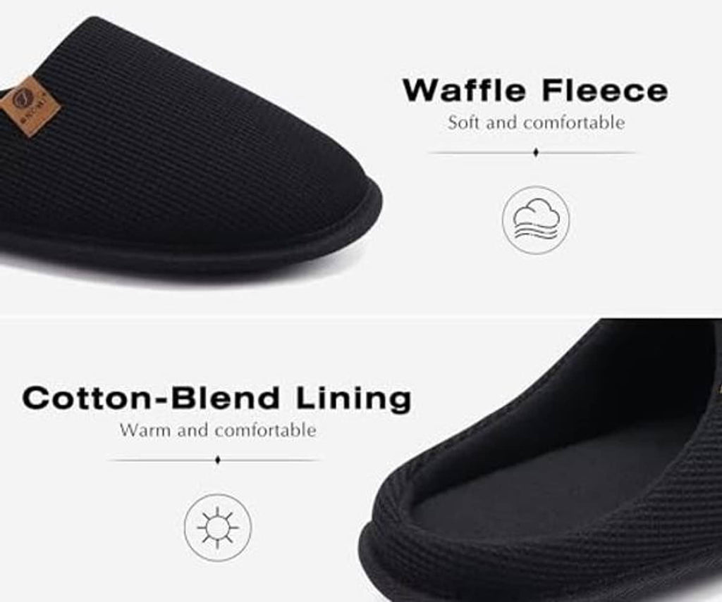 Black waffle fleece house slipper with textured upper and soft fabric lining.