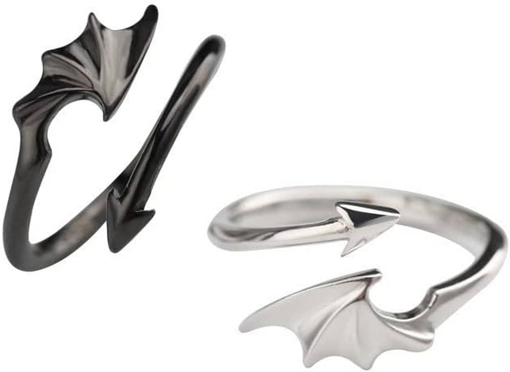 Silver bat-wing rings set with heart and lightning details