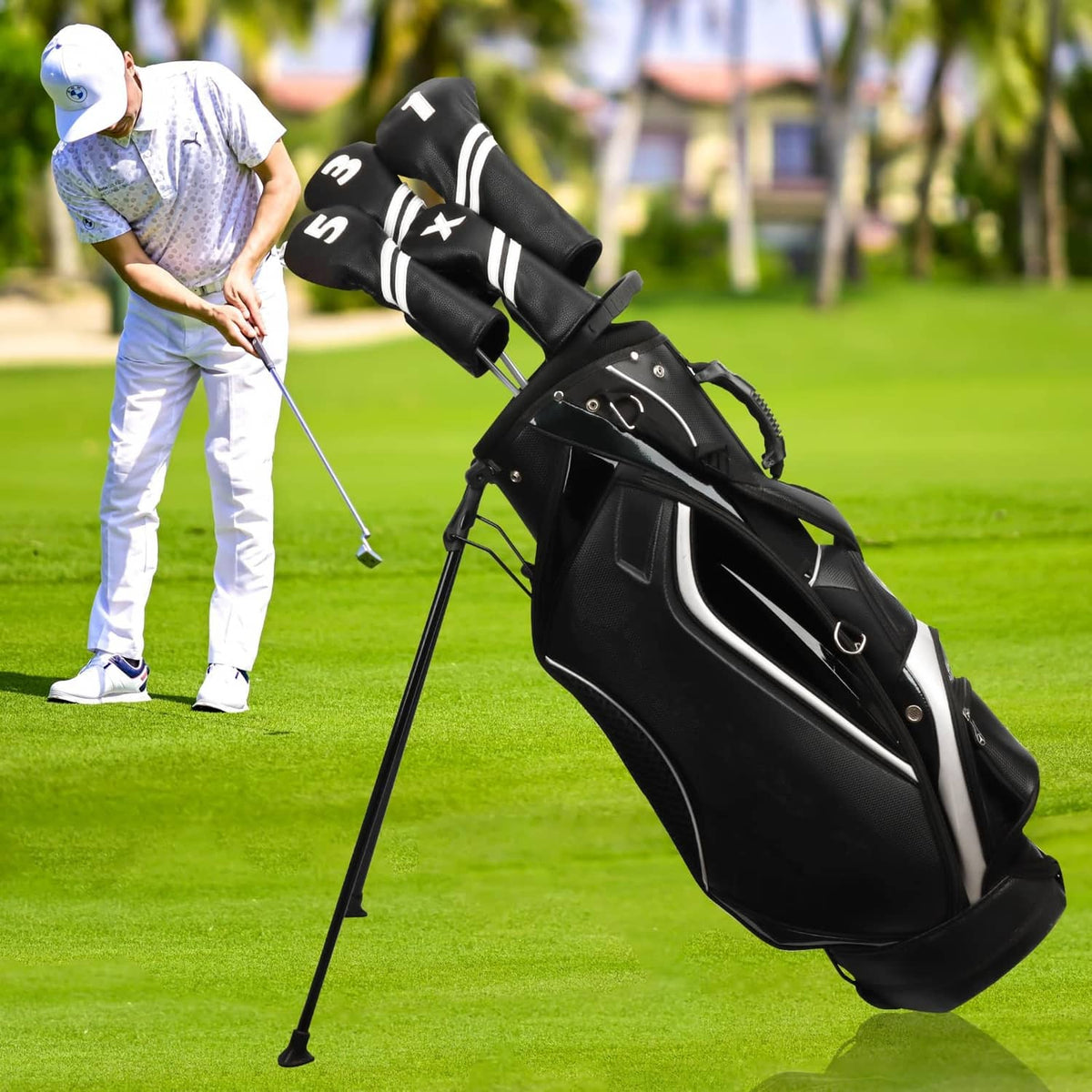 Black golf hybrid headcovers on a bag, with white stripes and number/mark patches