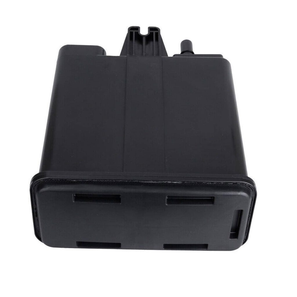 Black EVAP vapor canister top view with three posts and front mounting slots