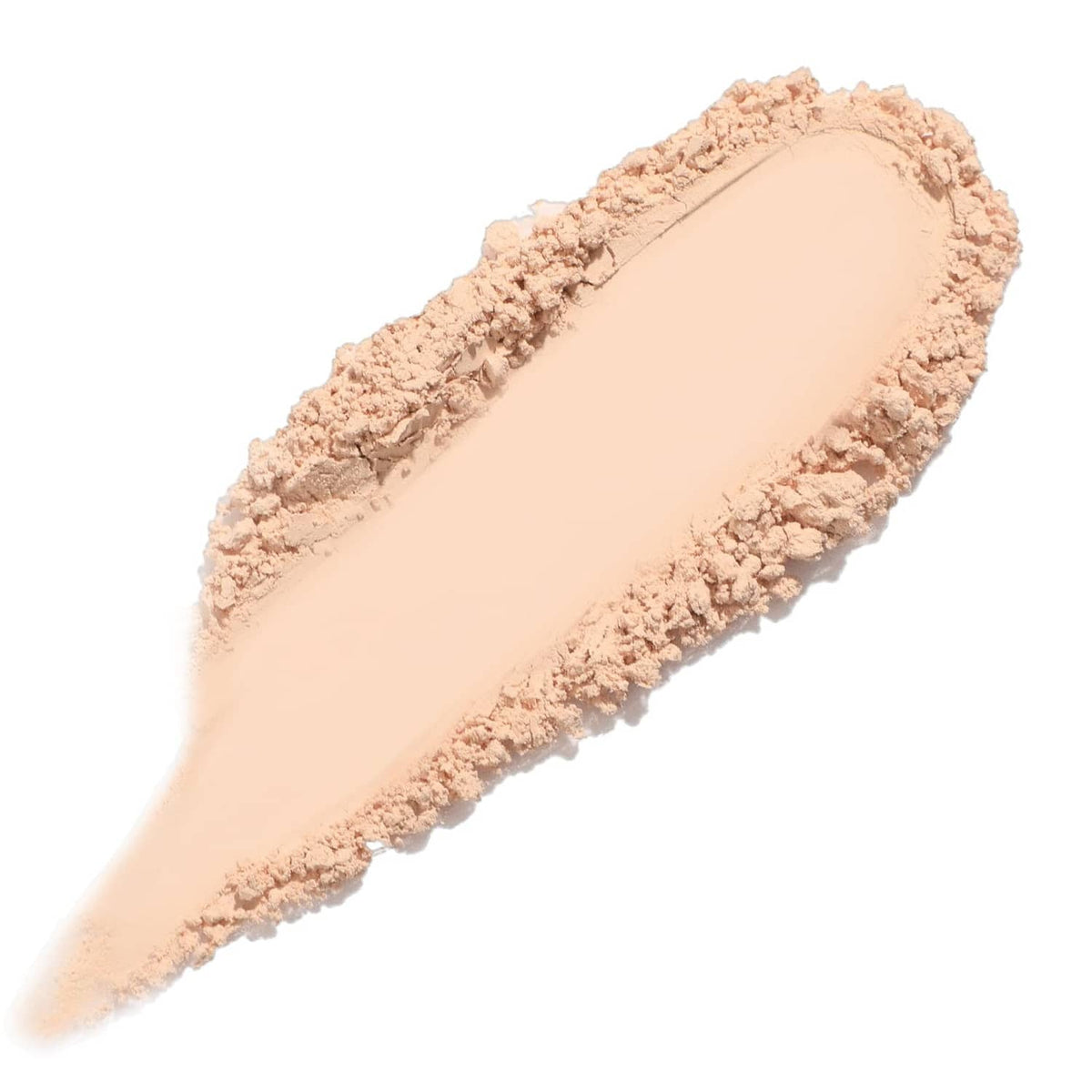 Beige pressed powder swatch with textured crumb edge
