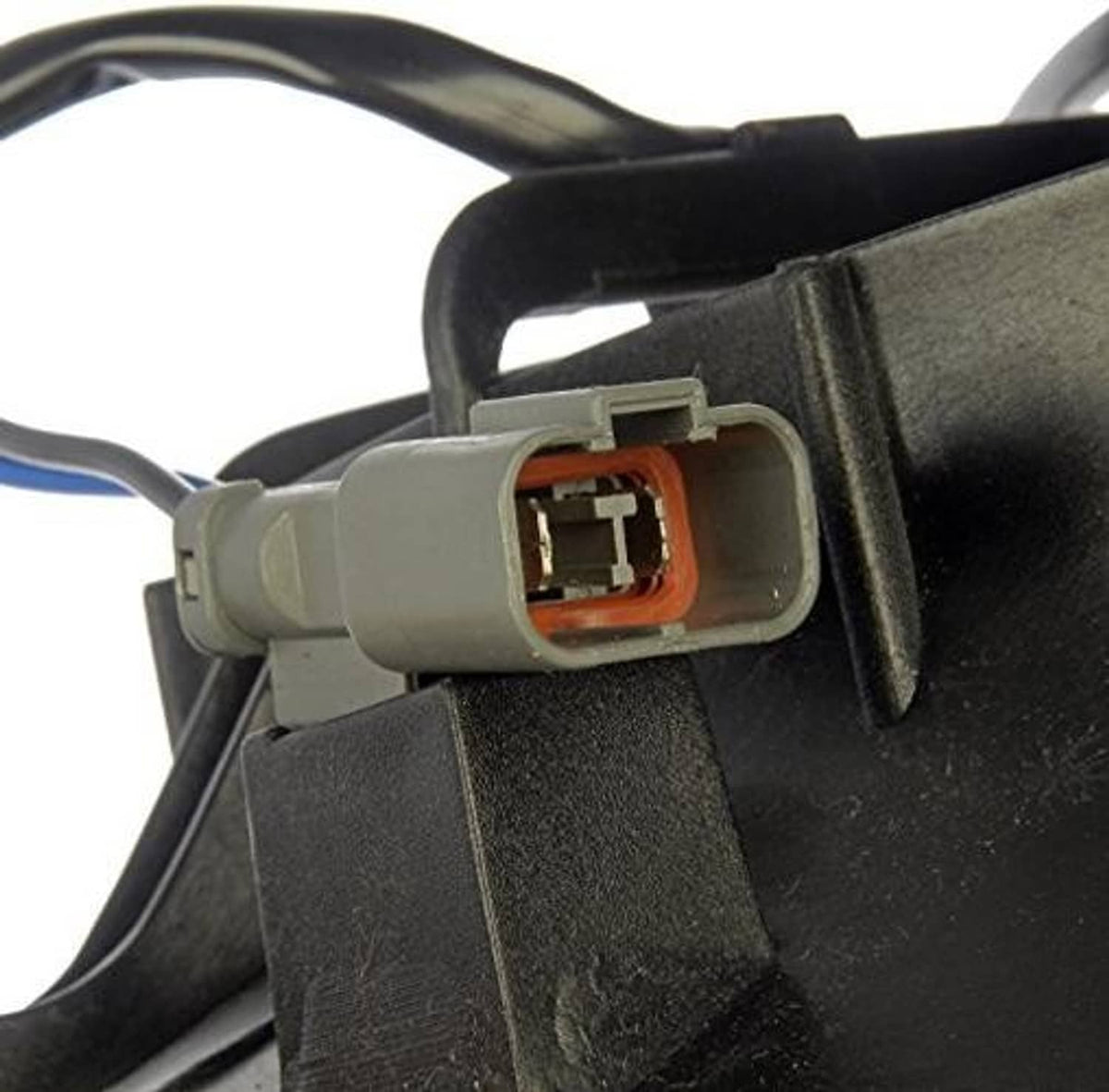 Cooling fan connector plug on black radiator fan shroud