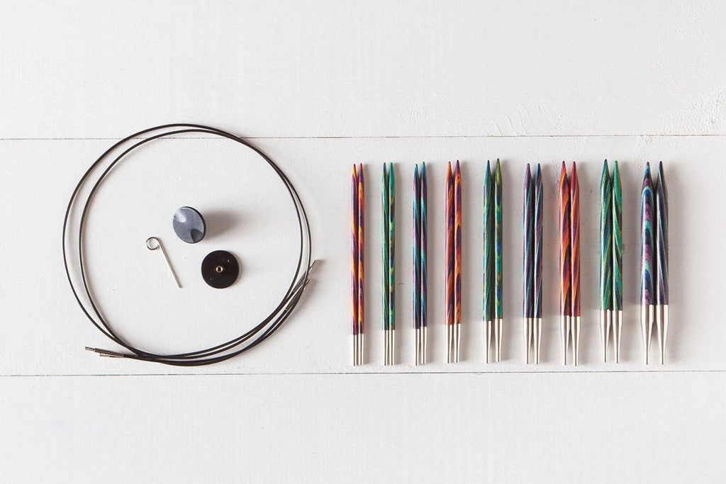 Circular knitting needle set with mosaic wood needles and two metal cable loops
