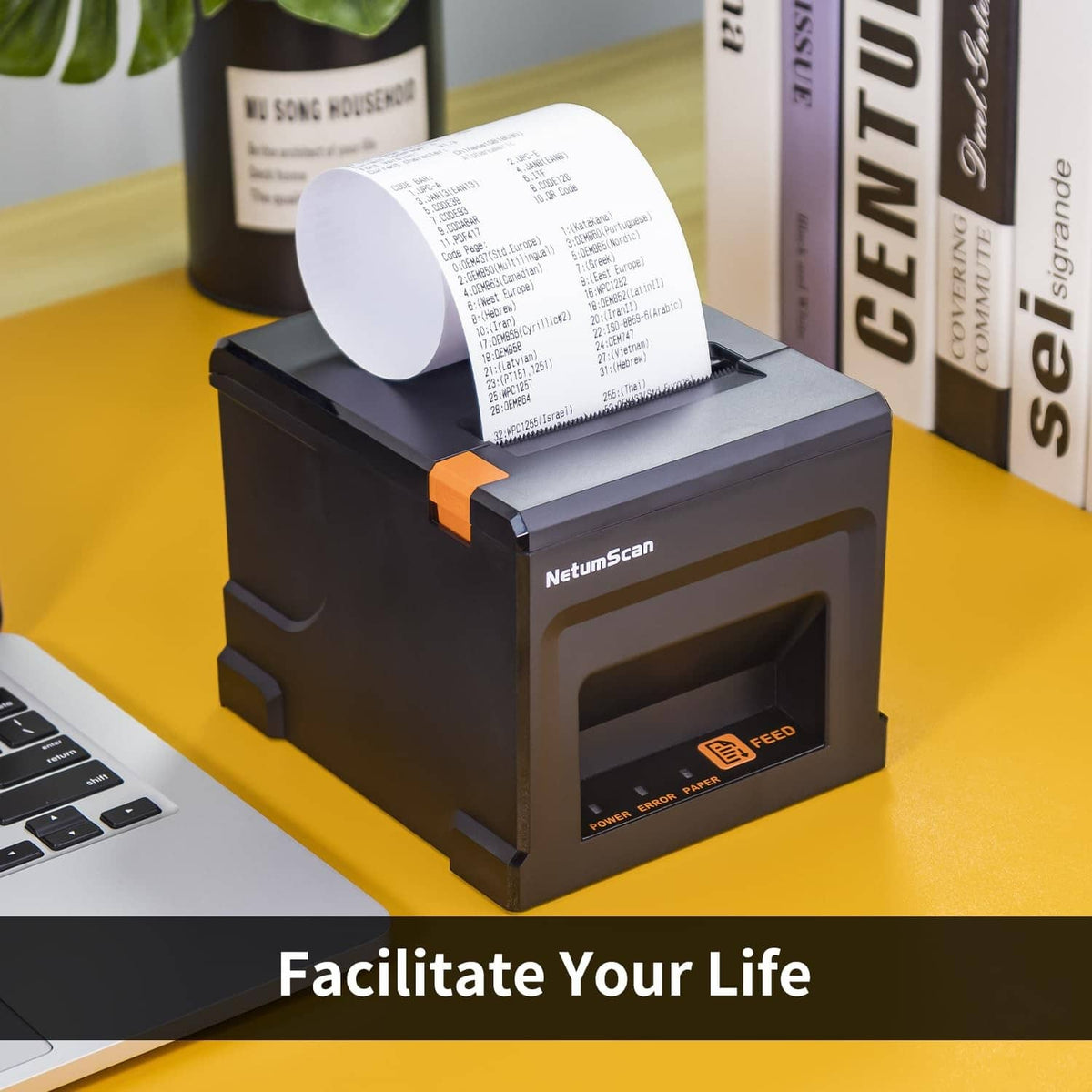 NetumScan black thermal receipt printer with loaded receipt paper on top