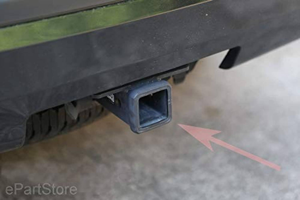 Black hitch receiver cover installed on the receiver, underside close-up.
