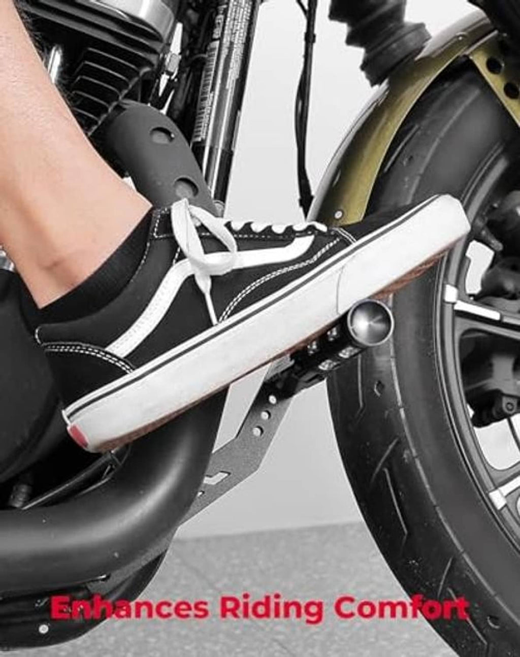 Installed folding highway foot peg with textured rubber foot and mounting hardware