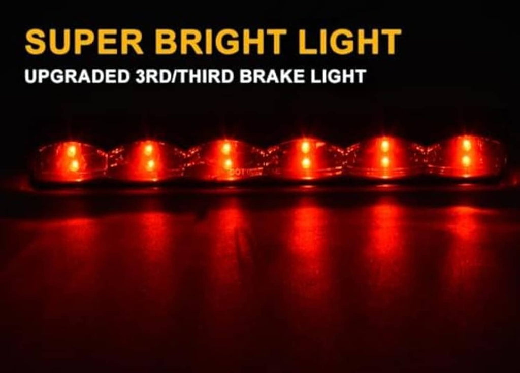 LED 3rd brake light bar glowing bright red with multiple lens sections