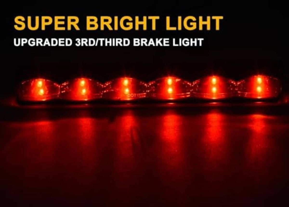 LED 3rd brake light bar glowing bright red with multiple lens sections