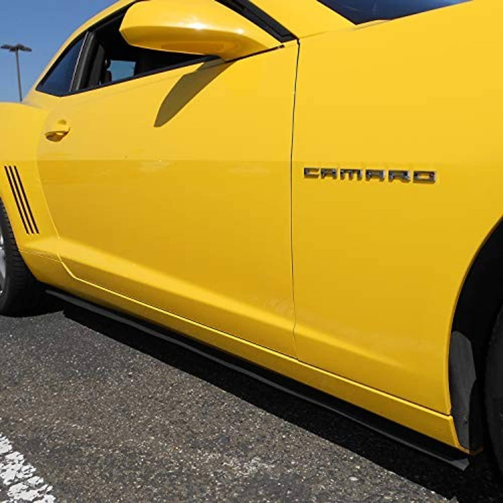 Yellow car with black universal side skirt trim along the side rocker