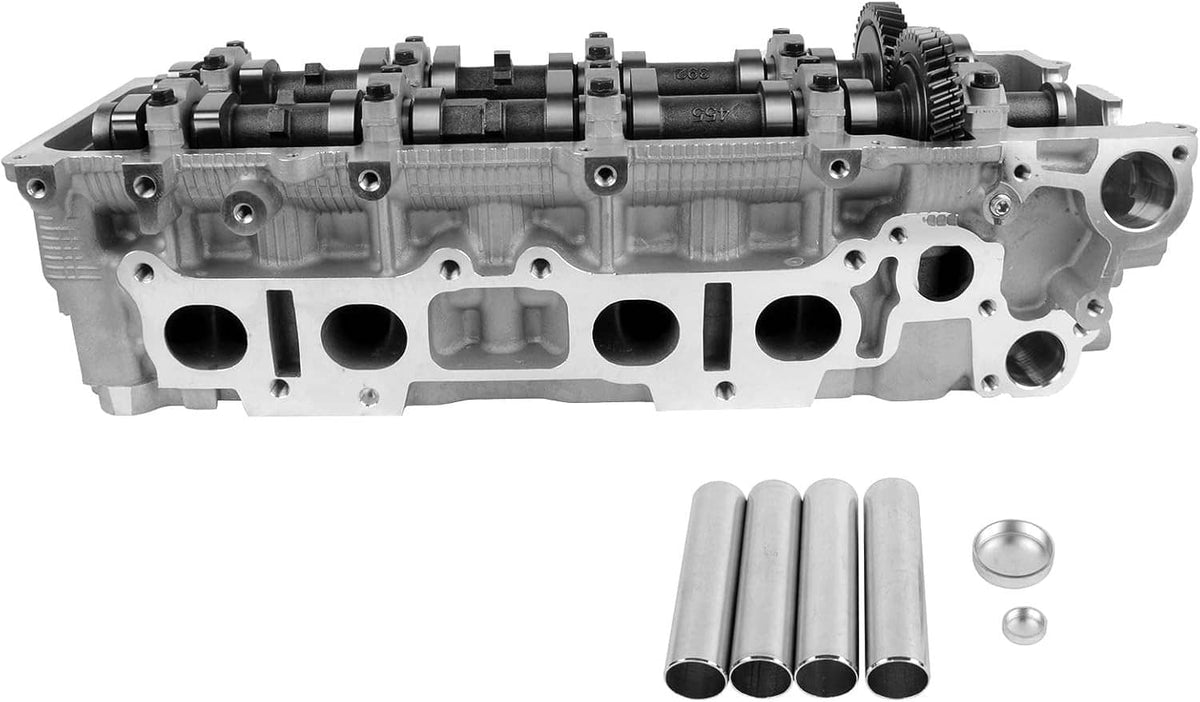 Cylinder head with open valve ports and intake/exhaust openings, silver metal
