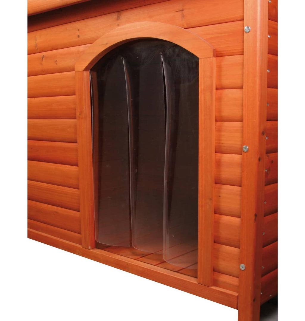 Black vinyl dog door flap installed in a wooden dog house opening with hanging panels
