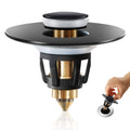 Matte black pop-up bathroom sink drain stopper with round cover and brass body