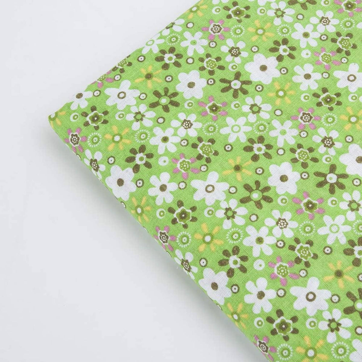 Cotton fabric square with green background and mixed small flower print