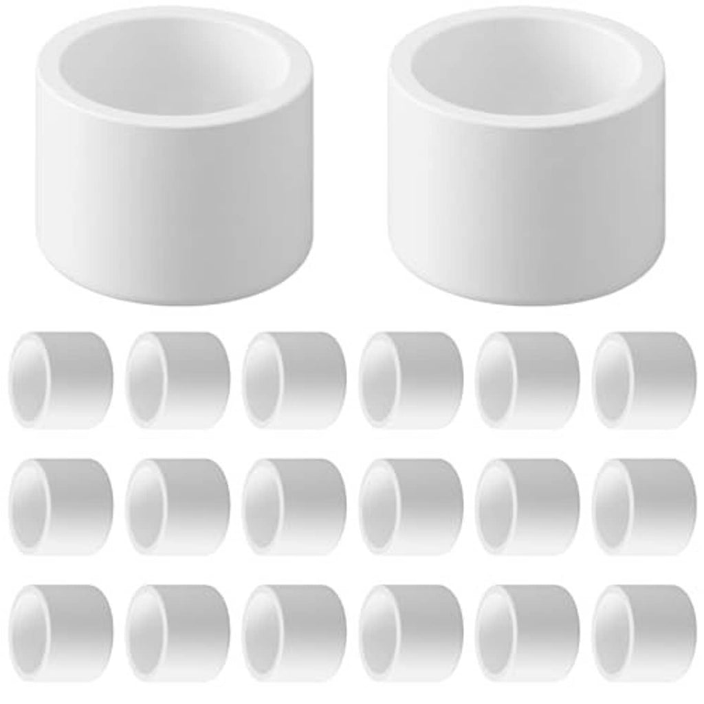 White PVC pipe end cap fittings, multiple round caps with open inner holes