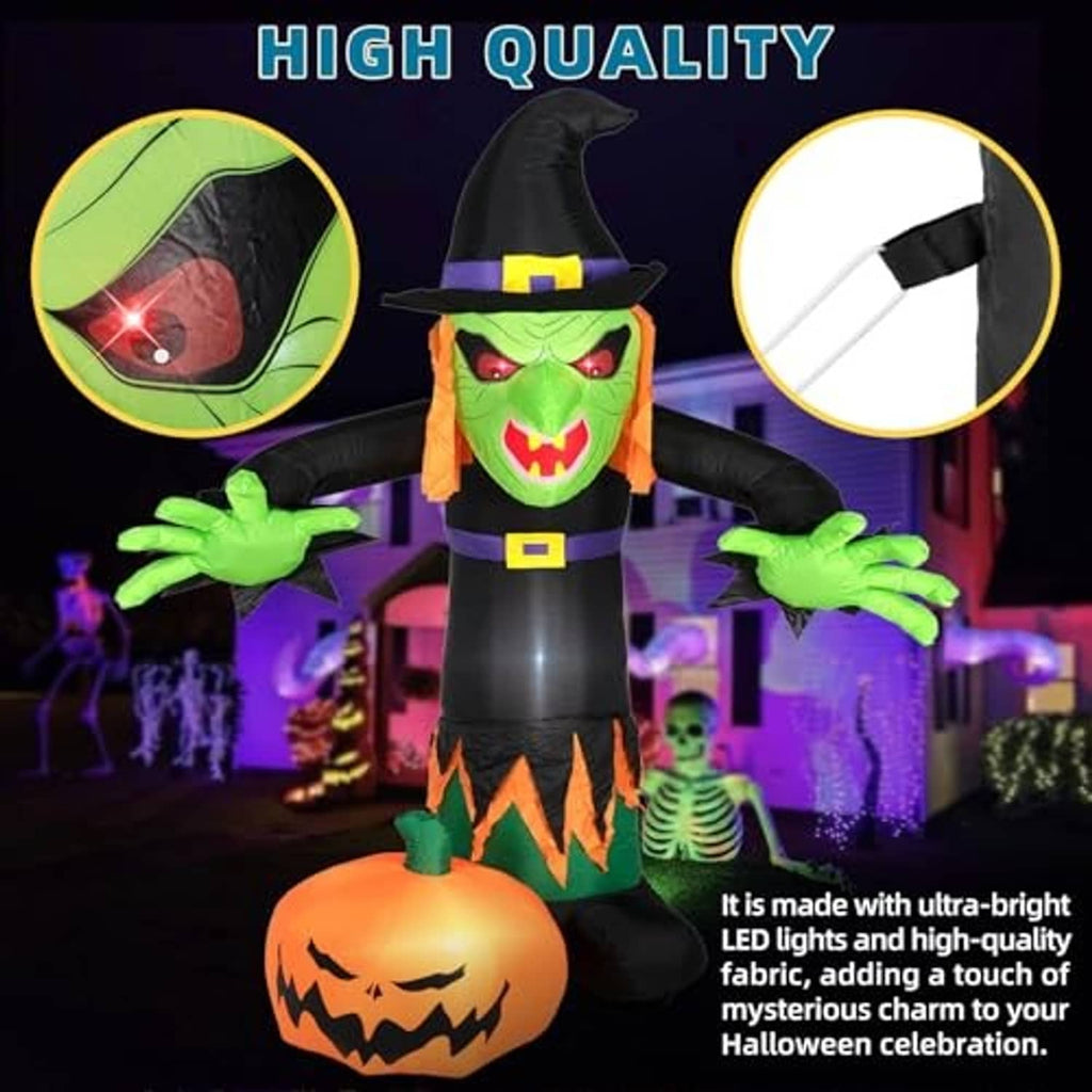 Inflatable Halloween witch with green face and glowing eyes, black hat, and orange pumpkin