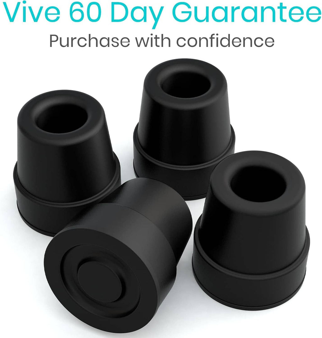 Four black quad cane replacement rubber tips with circular tread