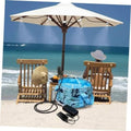 Portable misting system with foldable blue bucket, black pump, cables, and mist nozzle