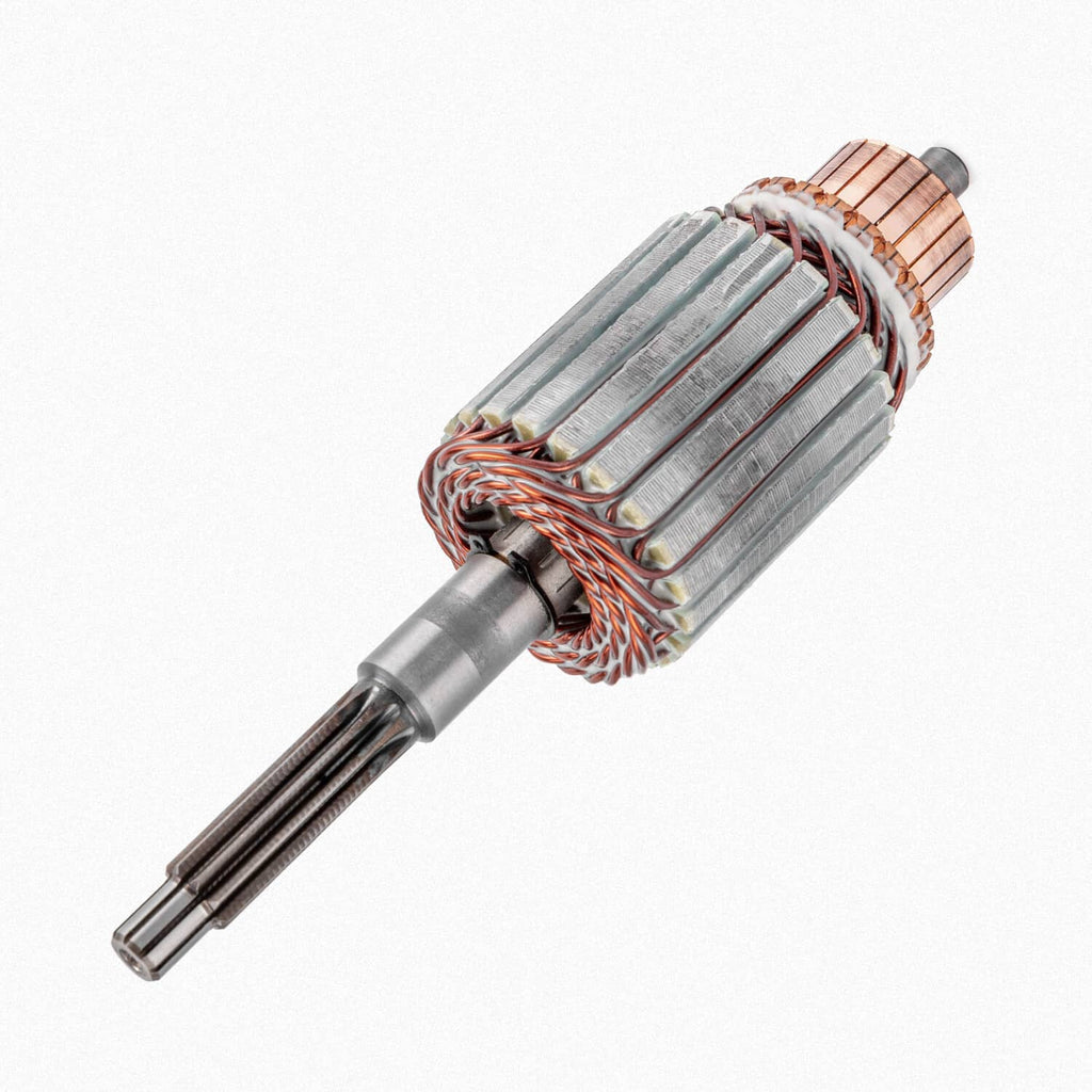 Starter motor armature with copper windings and steel shaft, close-up detail.
