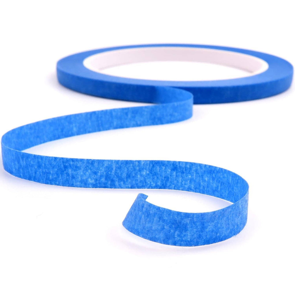 Blue painter's tape roll with two loose ribbon-length strips for masking.