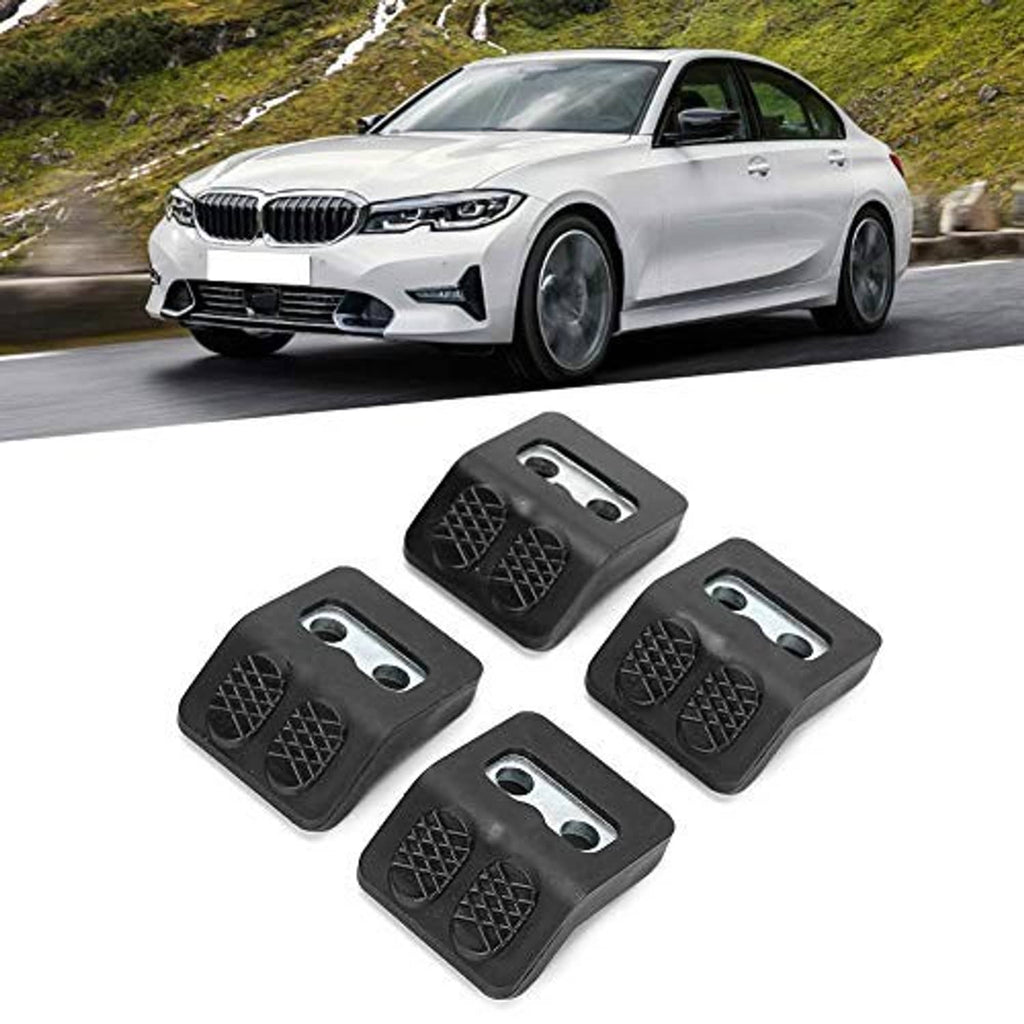 Black tire changer jaw protectors (4-pack) with textured pad inserts and two silver holes