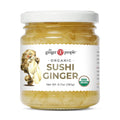Organic pickled sushi ginger jar with white lid and amber ginger pieces visible