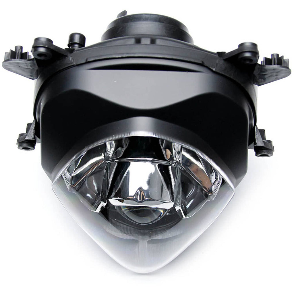 Front headlight assembly close-up with clear projector lens in black shroud