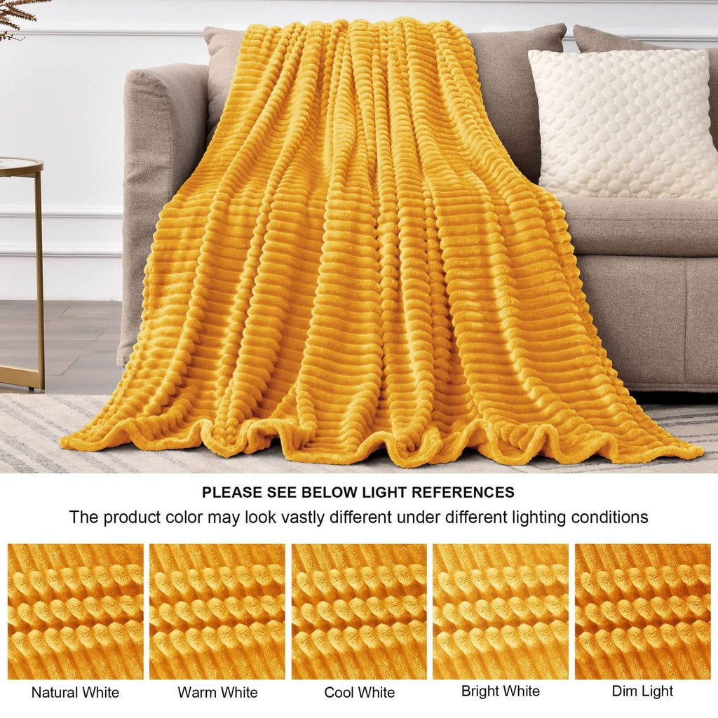 Yellow 3D ribbed jacquard fleece throw blanket draped across couch