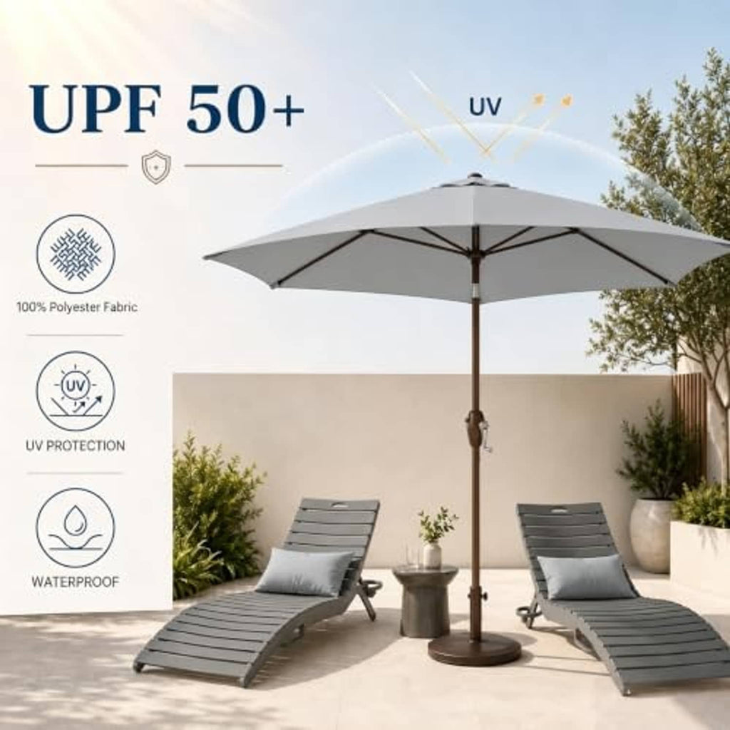 Open light gray patio umbrella with wooden pole in outdoor patio seating area