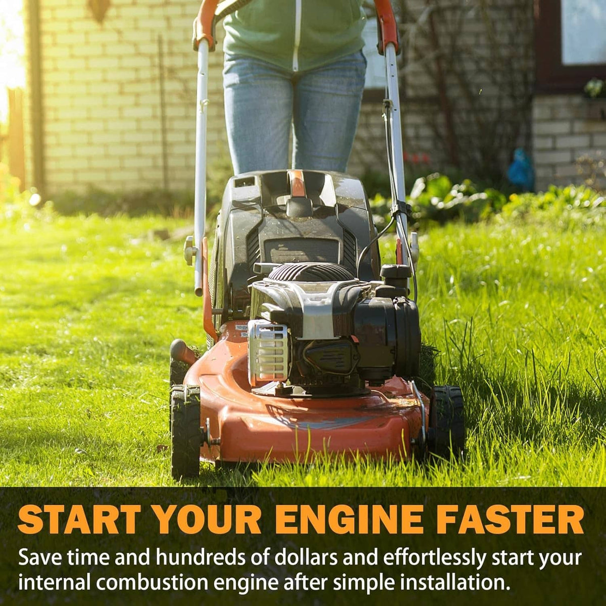 Recoil starter on an orange gas lawn mower with a black pull handle
