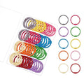Colorful metal binder rings in a clear organizer tray, various loop colors