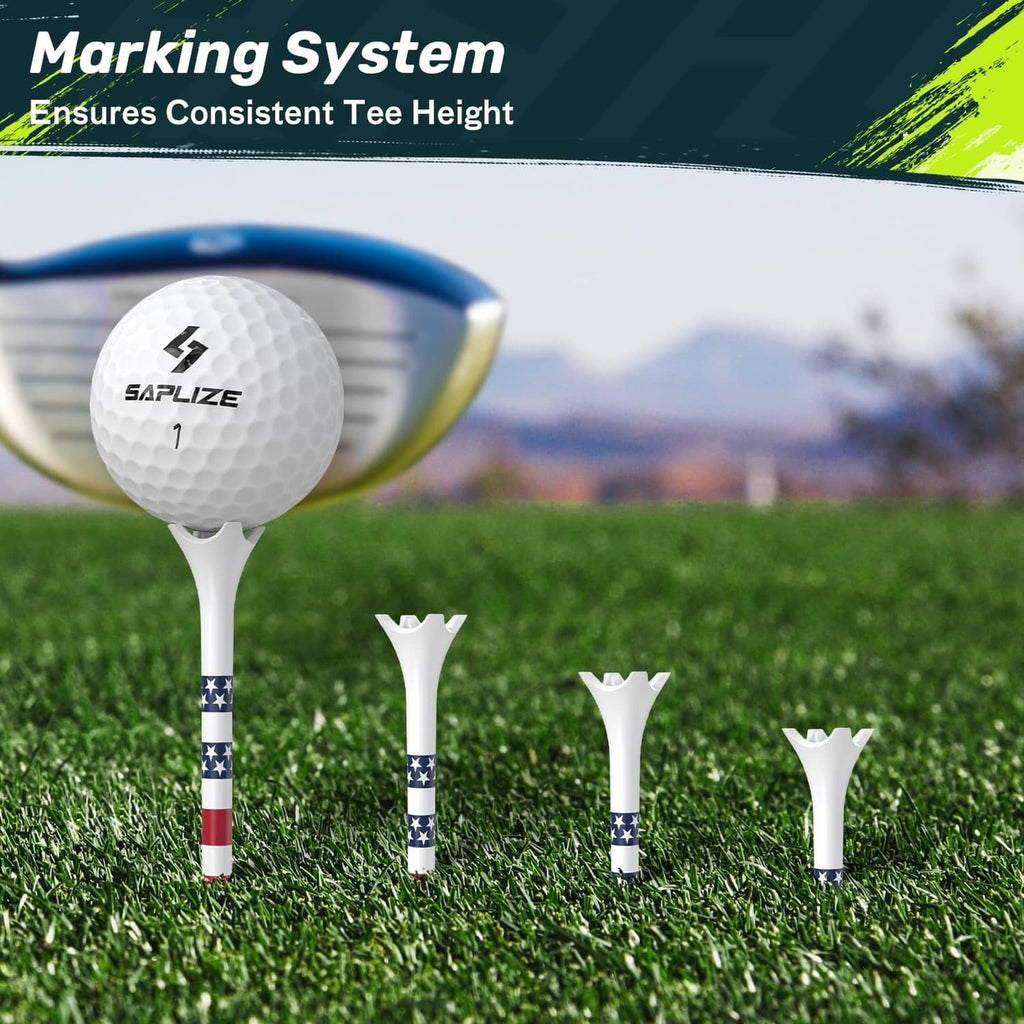 Multiple white golf tees with star-and-stripe bands on grass, one holding a ball