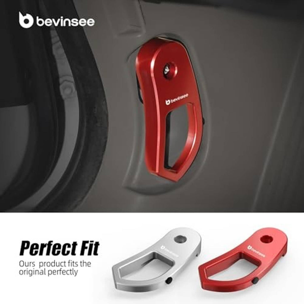 Red hood latch release lever handle bracket attached to hood latch assembly.