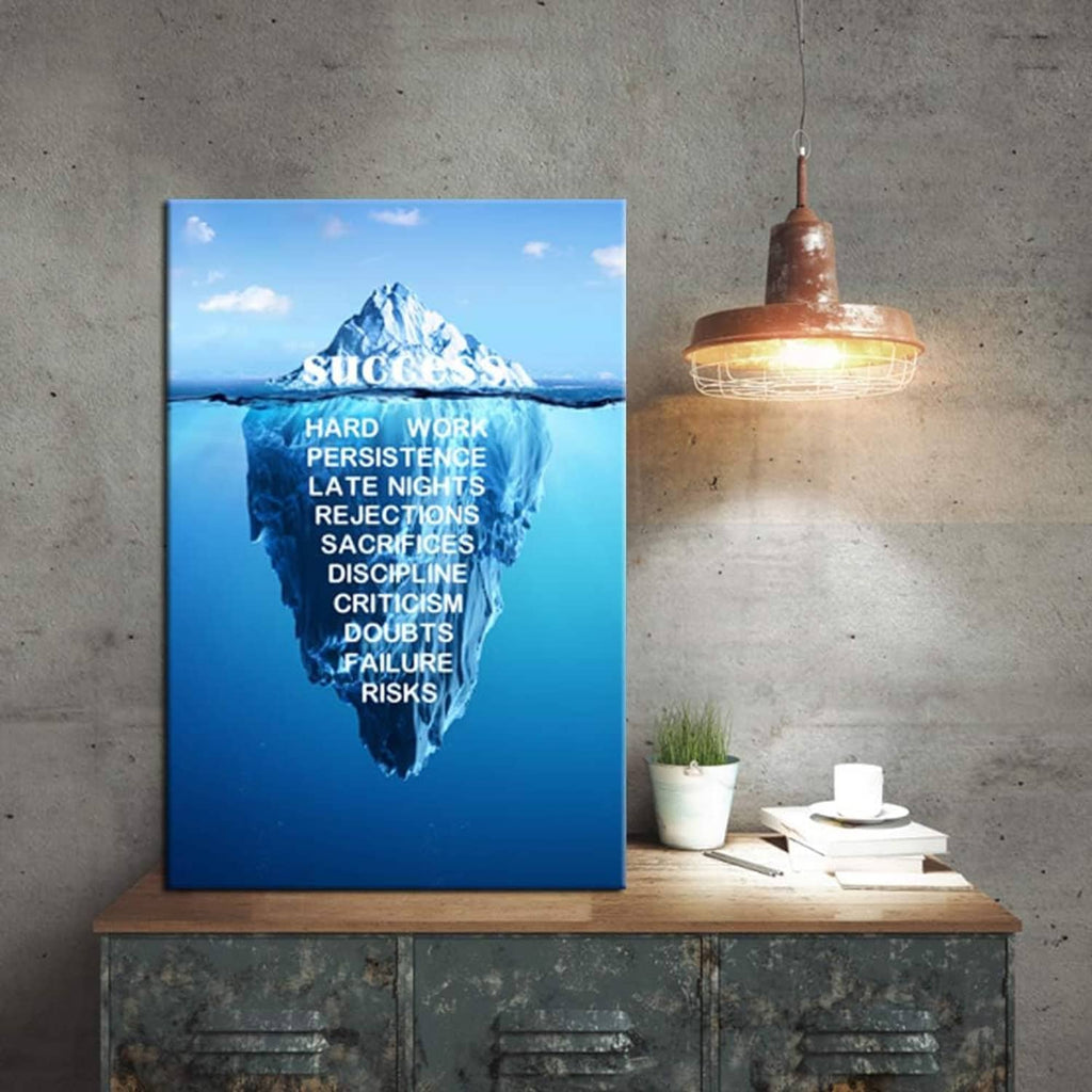 Stretched canvas wall art featuring an iceberg and bold white success quote