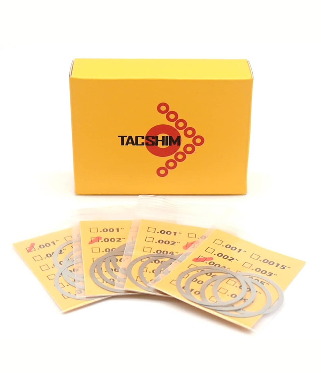 TACSHIM yellow box with multiple blister packs of gray barrel nut shim rings