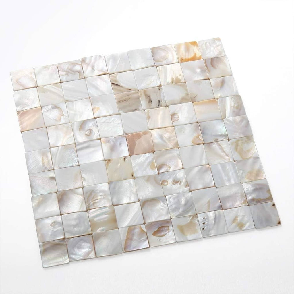Mother-of-pearl mosaic tile sheet with square pieces in pearl white and beige