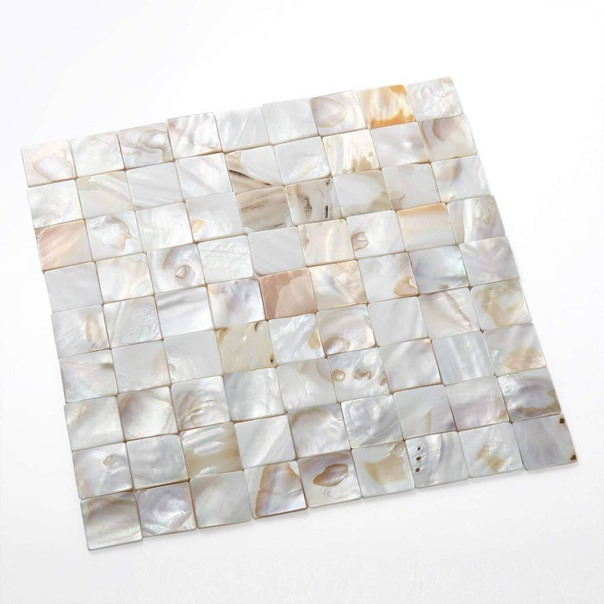 Mother-of-pearl mosaic tile sheet with square pieces in pearl white and beige