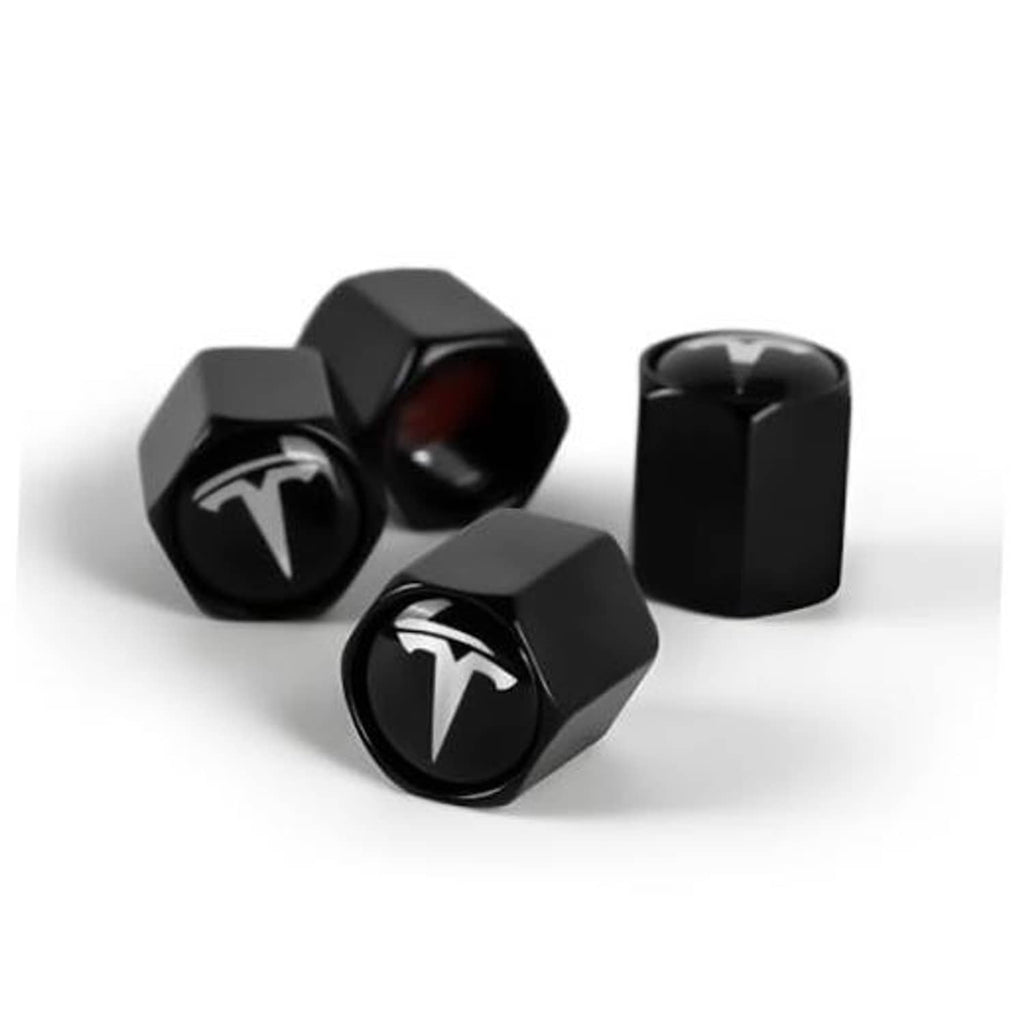 Black hex tire valve stem caps with Tesla logo, four-piece set