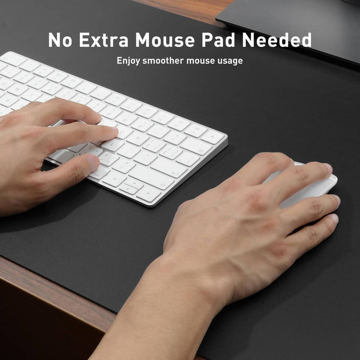 Non-slip black desk pad protector under keyboard and mouse with smooth surface