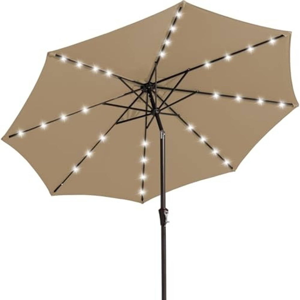 Beige patio umbrella with LED string lights and black pole, cross-frame view