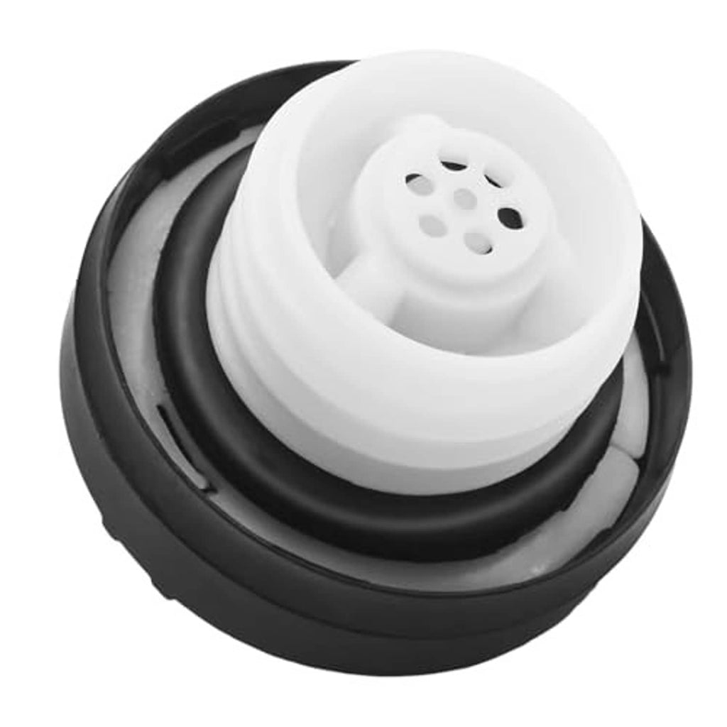 Fuel tank filler cap underside showing white inlet insert and mounting ring