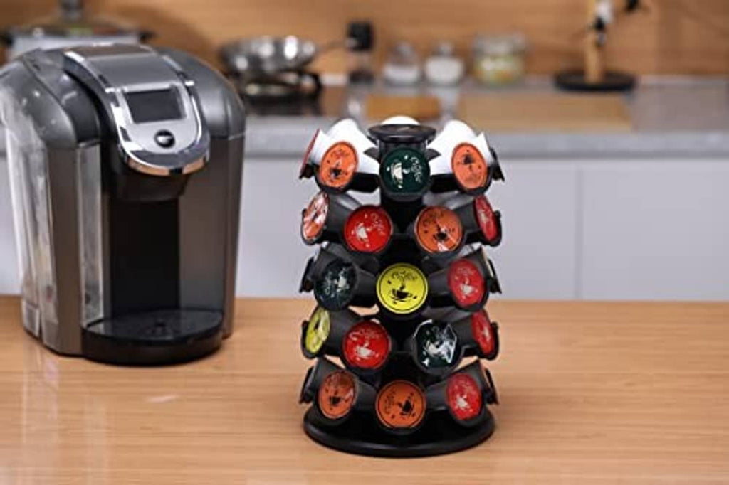 Coffee pod carousel organizer with rotating black base and multi-color pod faces