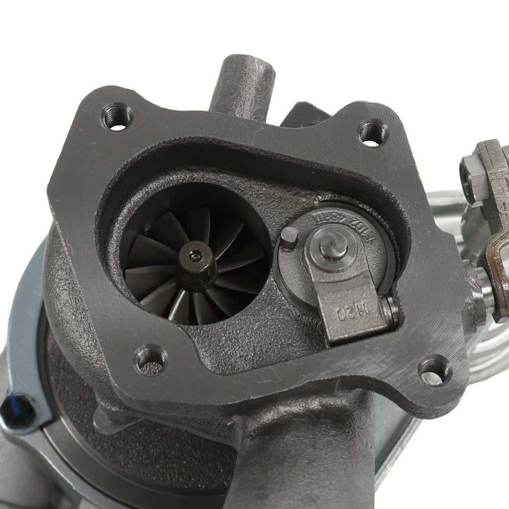 Close-up of turbocharger turbine housing with compressor wheel