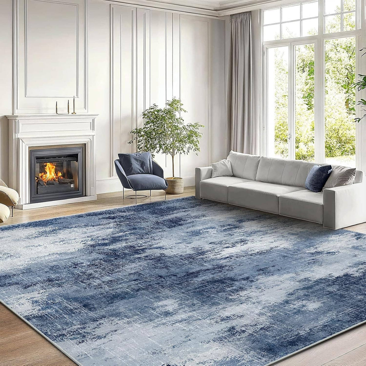 Blue distressed area rug under sofa and fireplace, modern abstract look