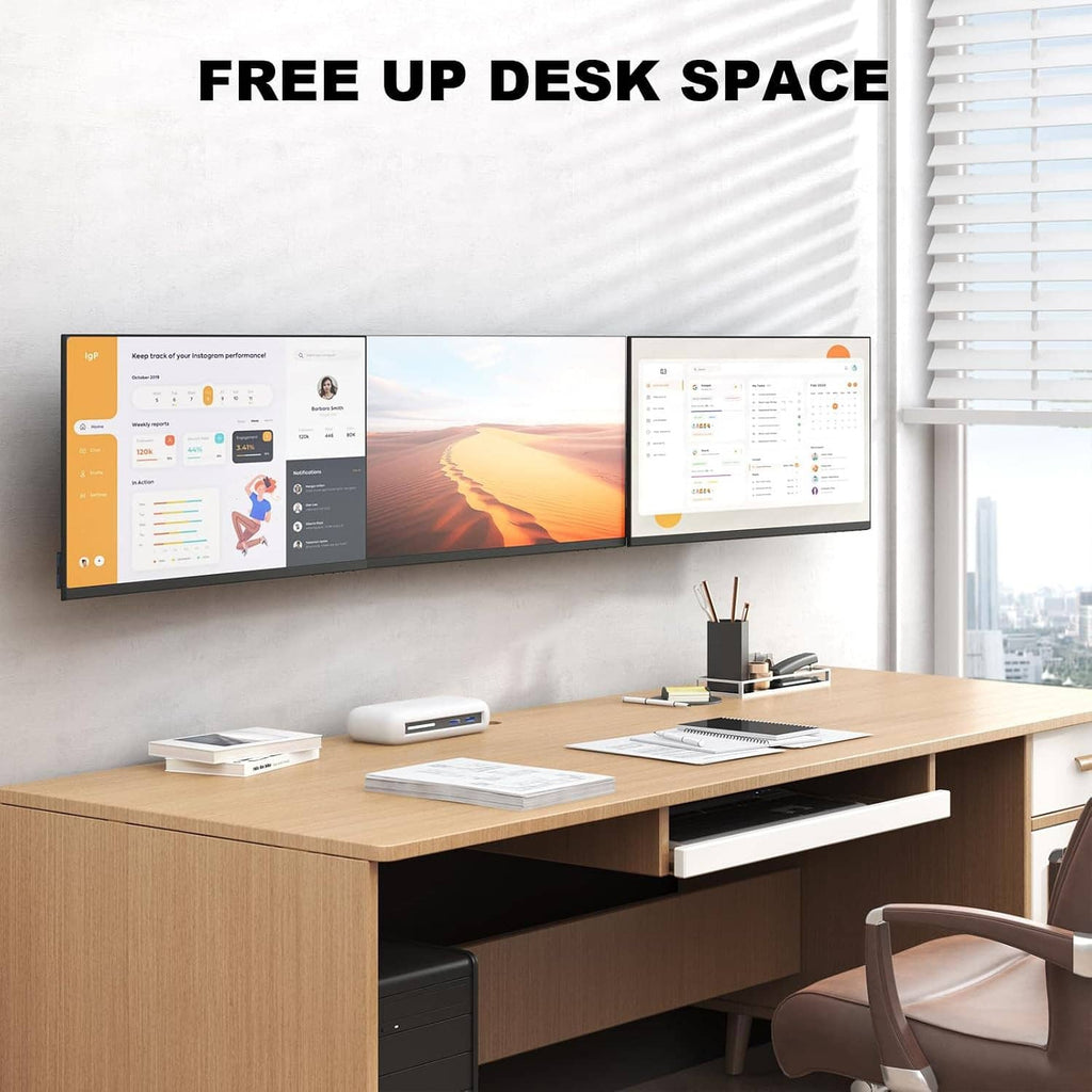 Triple monitor wall mount on wall under blinds, holding three monitors above a desk